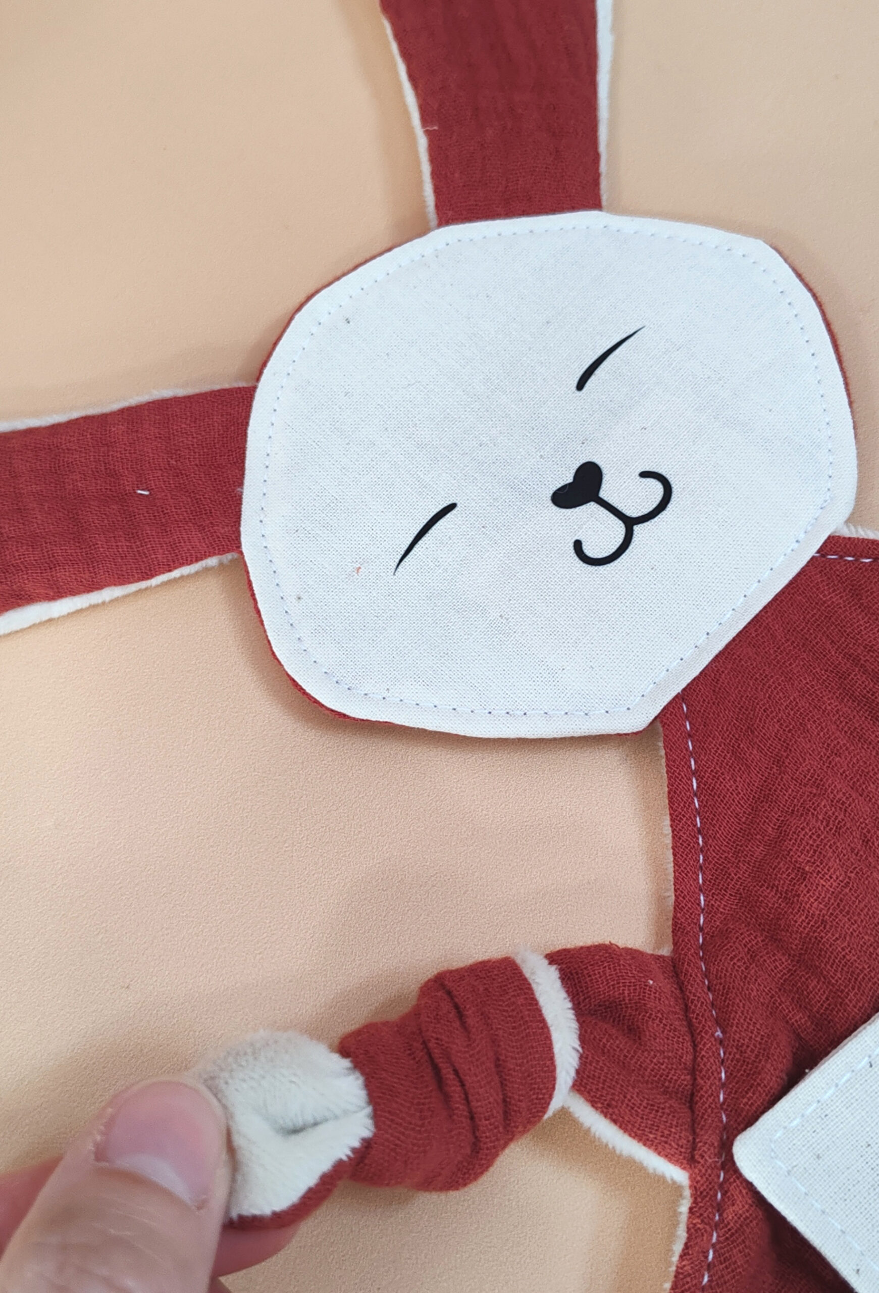 doudou-etapes-pma-lapin-uni-terracotta-tete